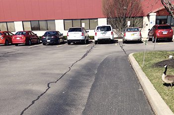 Bad Parking Lot Paving in Rochester, NY | North Coast Property Maintenance